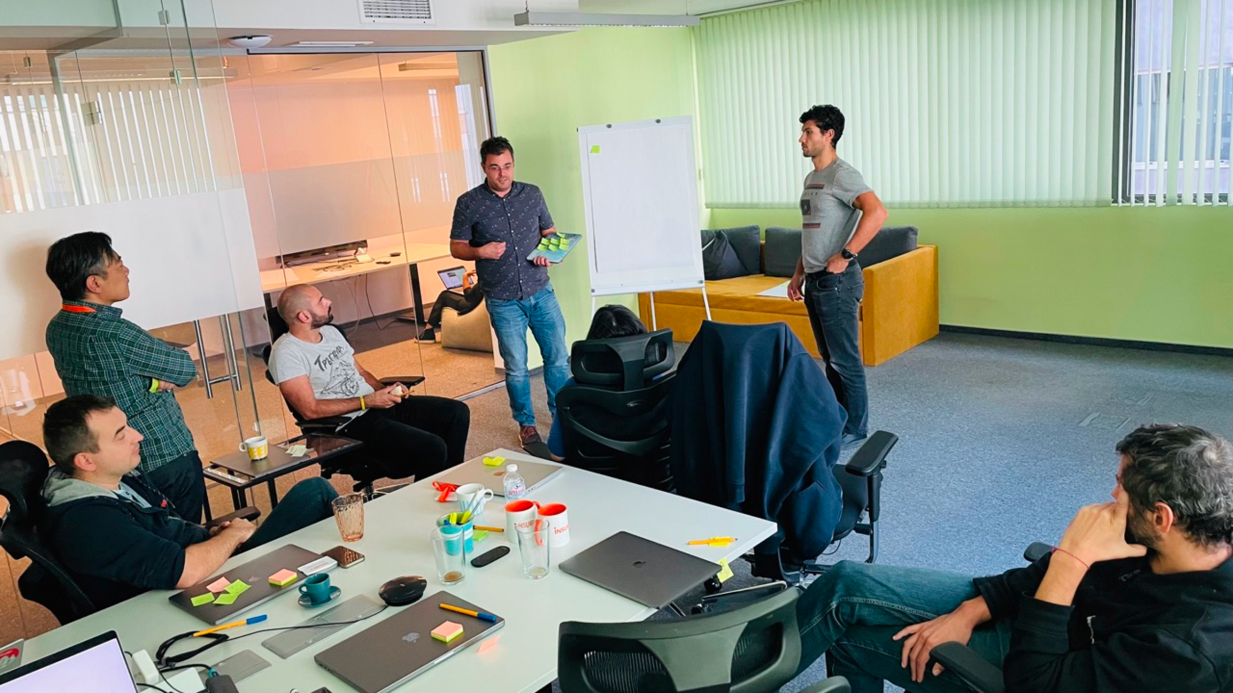 Insurify team workshop with participants and sticky notes